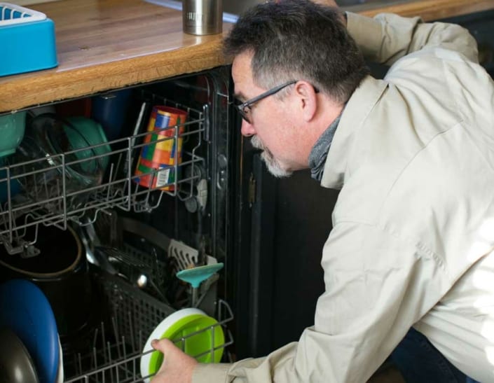 Randy Buster Inspecting Dish washer